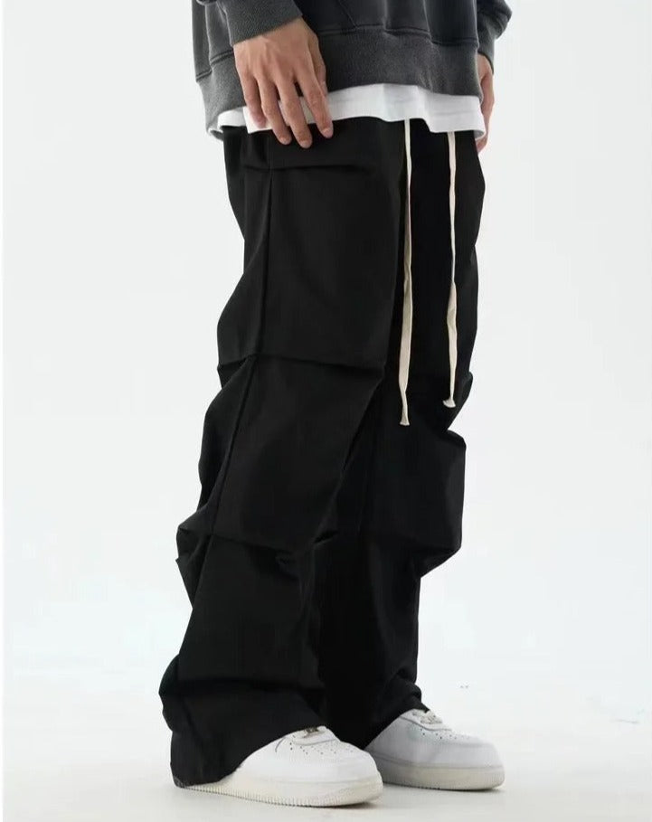 Pleated Elastic-Waisted Trousers