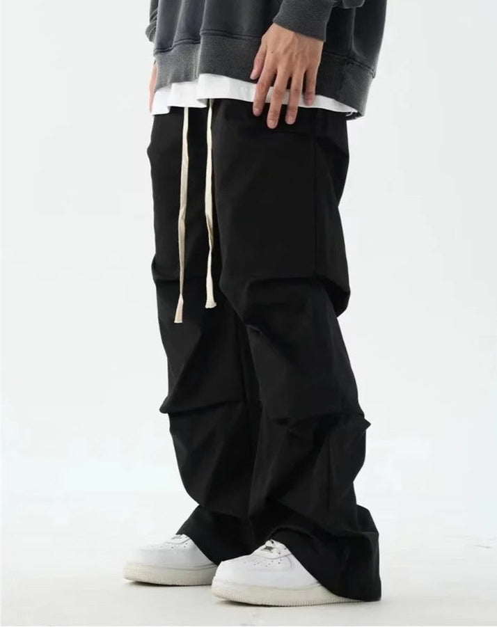 Pleated Elastic-Waisted Trousers