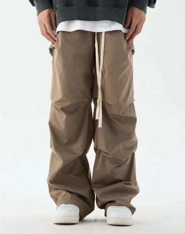 Pleated Elastic-Waisted Trousers