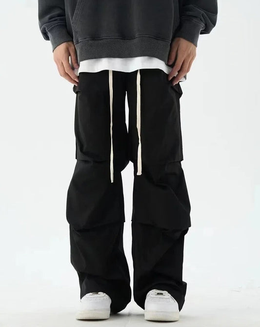 Pleated Elastic-Waisted Trousers